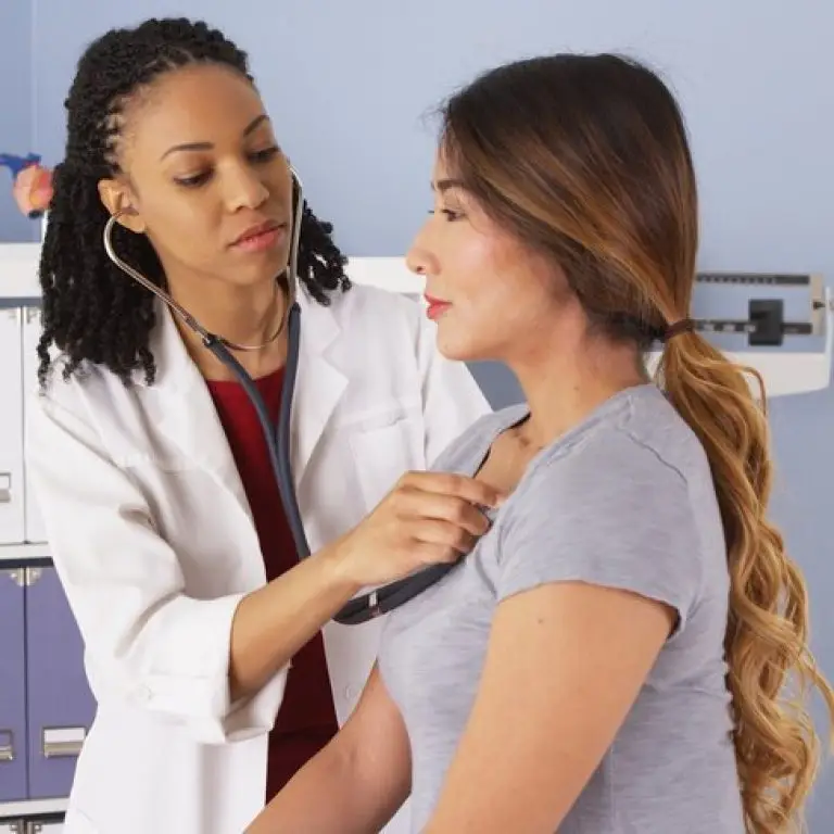 Doctor and Patient in Primary Care Medical Clinic